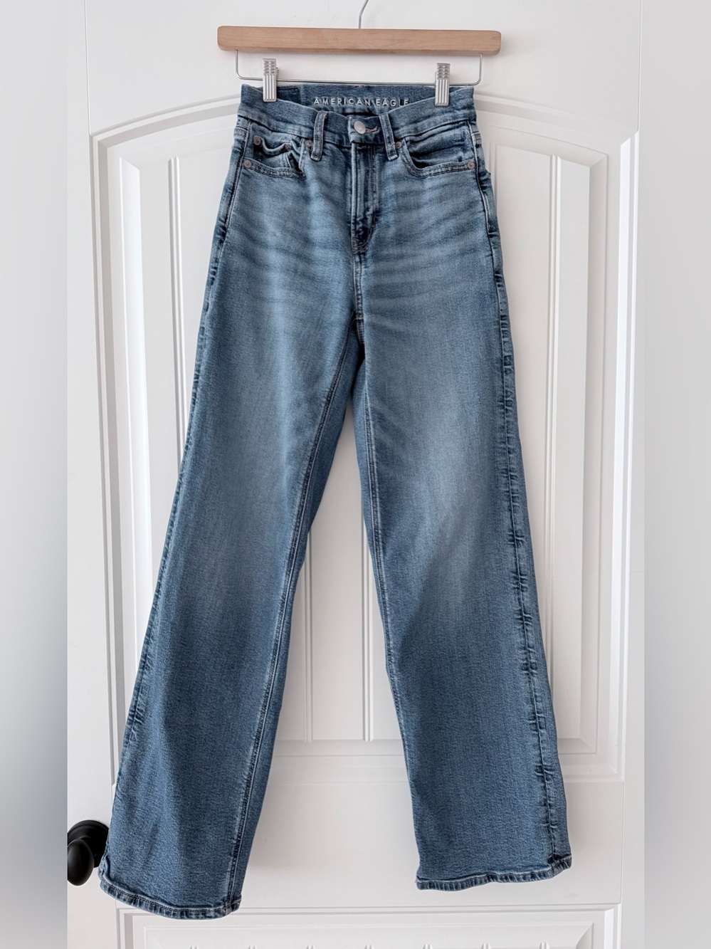 American Eagle Outfitters Women's Curvy Super High-Rise Baggy Straight Jeans.